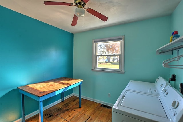 clothes washing area featuring hardwood / wood-style floors, ceiling fan, and separate washer and dryer