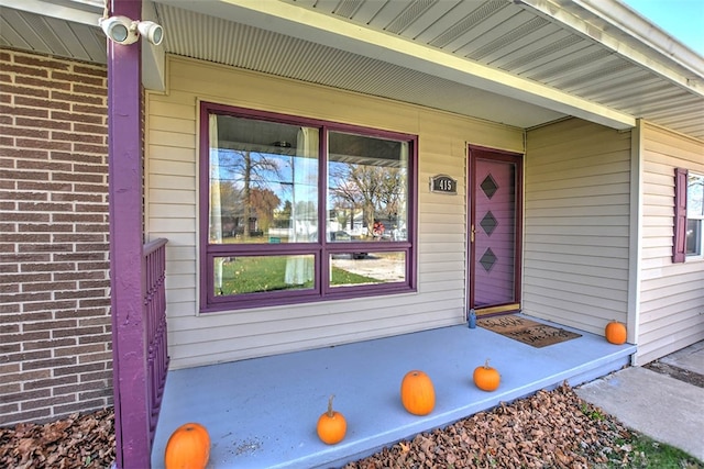 entrance to property with a porch