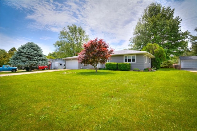 635 E N St, Warrensburg, IL 62573 - view of front facade with a front lawn and driveway