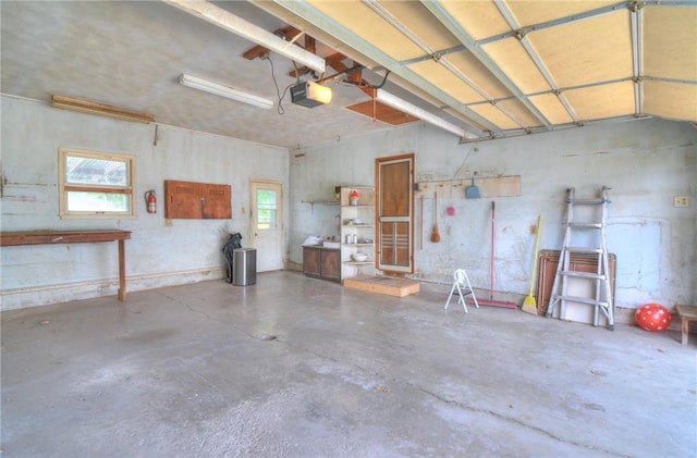 635 E N St, Warrensburg, IL 62573 - garage featuring a garage door opener
