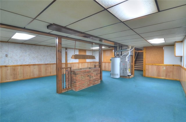 635 E N St, Warrensburg, IL 62573 - finished basement featuring water heater, a drop ceiling, stairway, heating unit, and carpet flooring