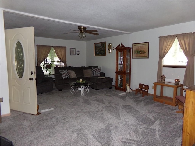 210 Kennedy Ave, Pana, IL 62557 - carpeted living area with ceiling fan