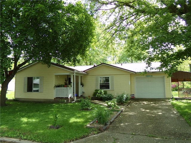 210 Kennedy Ave, Pana, IL 62557 - ranch-style home featuring a garage, a front lawn, concrete driveway, covered porch, and a carport