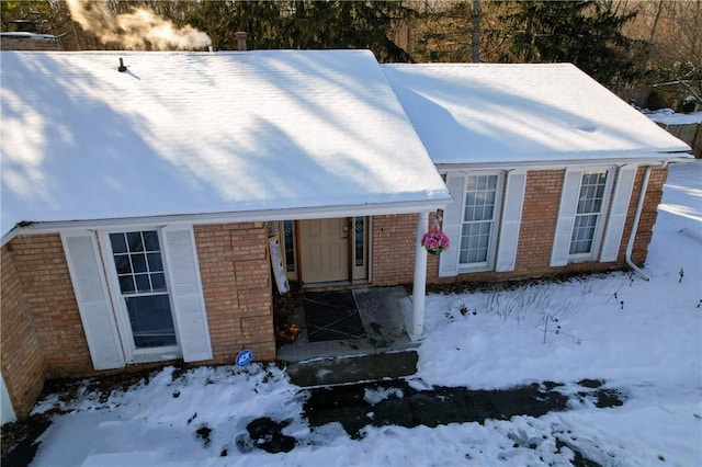 view of snow covered property