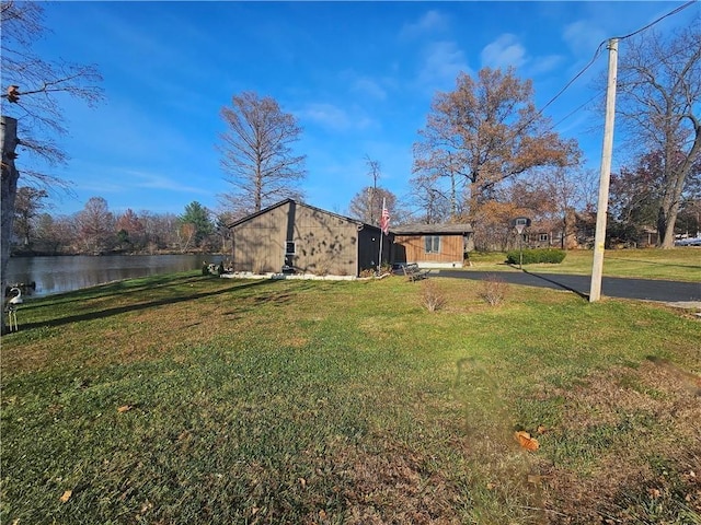 view of yard with a water view