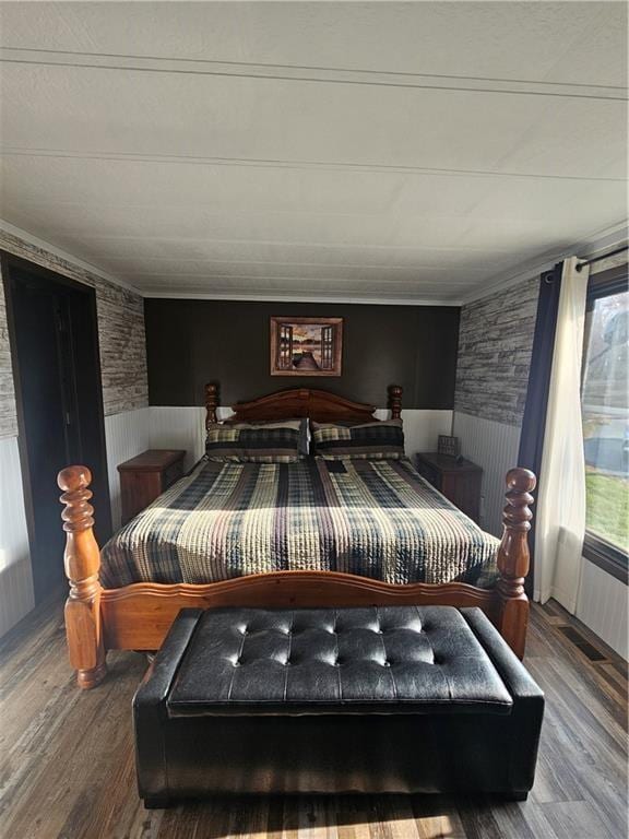 bedroom featuring wood-type flooring