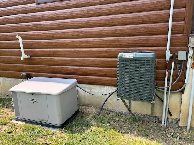 10760 E 1600th St, Cambridge, IL 61238 - exterior view of a power unit and a central AC unit