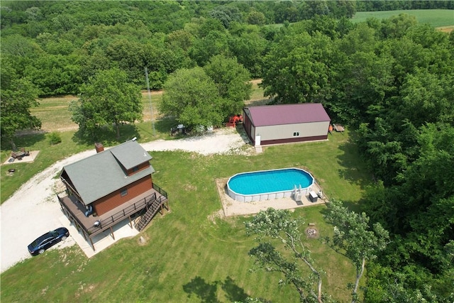 10760 E 1600th St, Cambridge, IL 61238 - view from above of property featuring a pool area and a forest