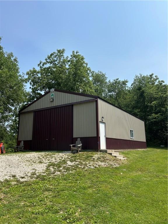 10760 E 1600th St, Cambridge, IL 61238 - view of pole building featuring a lawn