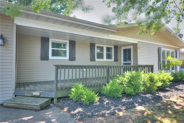 235 W Lawrence St, Illiopolis, IL 62539 - view of front of home with a wooden deck