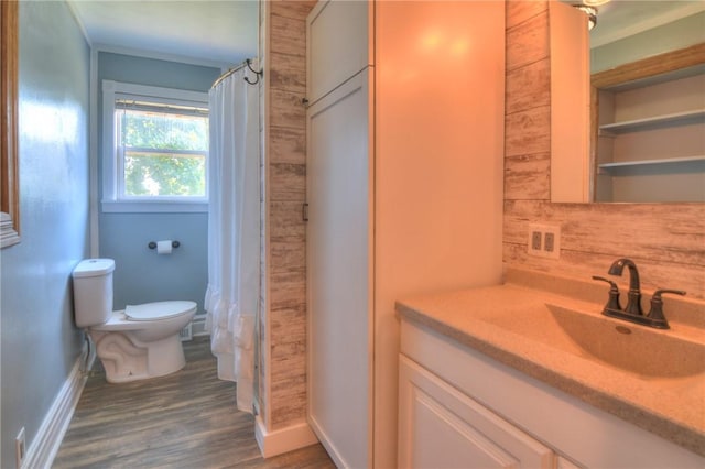 235 W Lawrence St, Illiopolis, IL 62539 - full bathroom featuring wood finished floors, vanity, and curtained shower