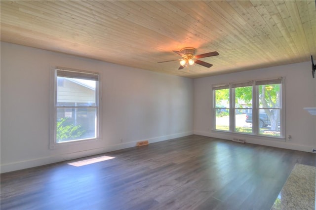 235 W Lawrence St, Illiopolis, IL 62539 - spare room featuring healthy amount of natural light, wood ceiling, ceiling fan, and wood finished floors