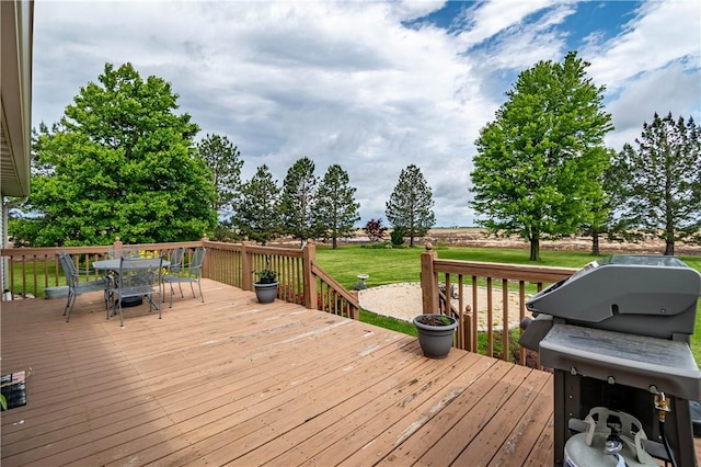 5334 Blue Mound Rd, Macon, IL 62544 - deck featuring outdoor dining area, area for grilling, and a yard