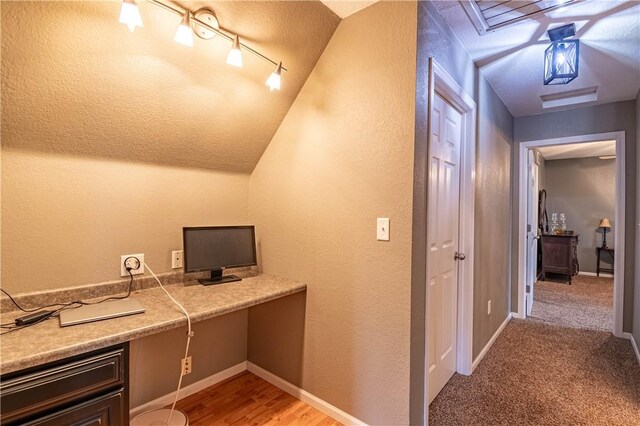 5334 Blue Mound Rd, Macon, IL 62544 - office space with built in study area, lofted ceiling, baseboards, a textured wall, and rail lighting