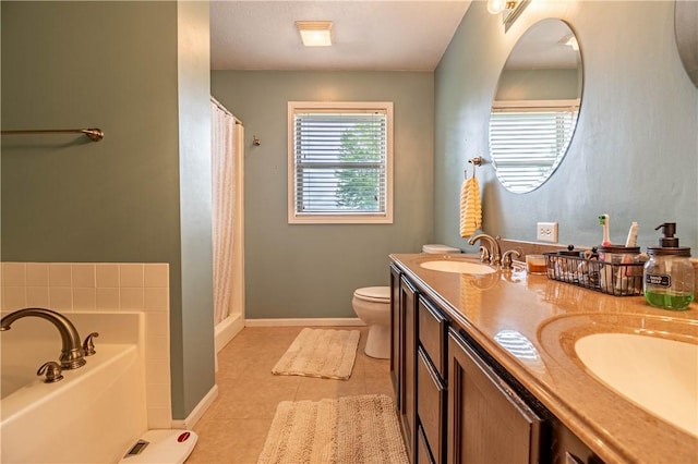 5334 Blue Mound Rd, Macon, IL 62544 - bathroom featuring toilet, double vanity, a garden tub, and a shower with shower curtain