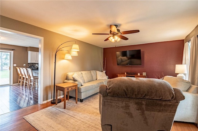 5334 Blue Mound Rd, Macon, IL 62544 - living area with a ceiling fan and light wood finished floors