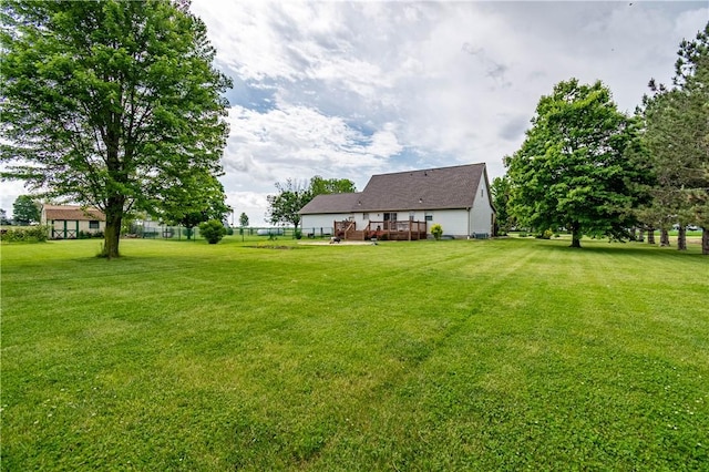 5334 Blue Mound Rd, Macon, IL 62544 - view of grassy yard with a wooden deck