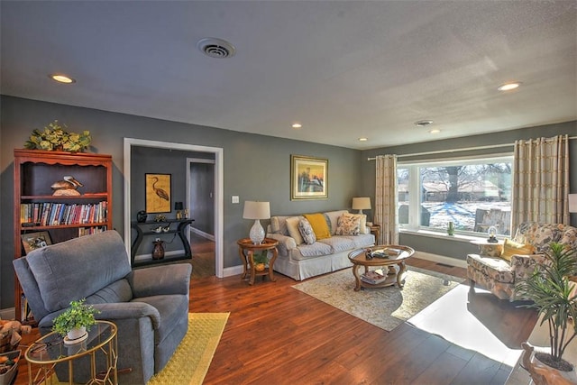 living room featuring dark hardwood / wood-style floors