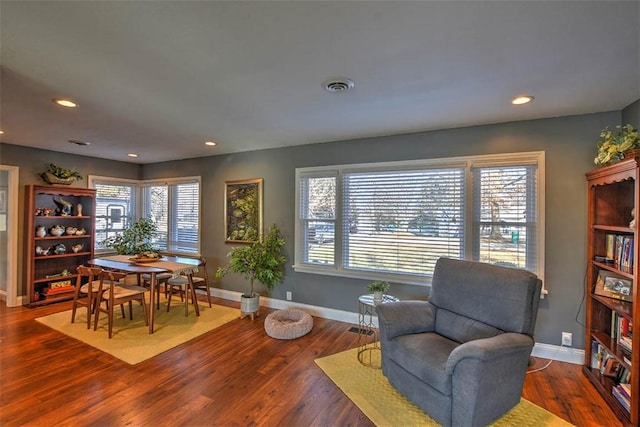 living area featuring dark hardwood / wood-style floors