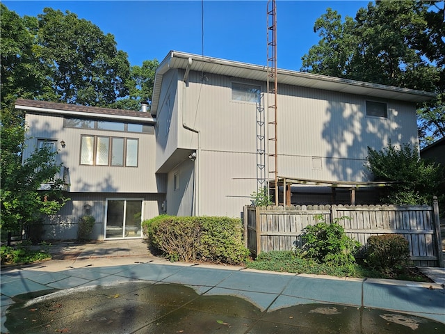 back of house featuring a patio area