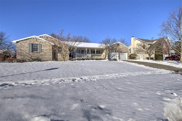 ranch-style home with a garage