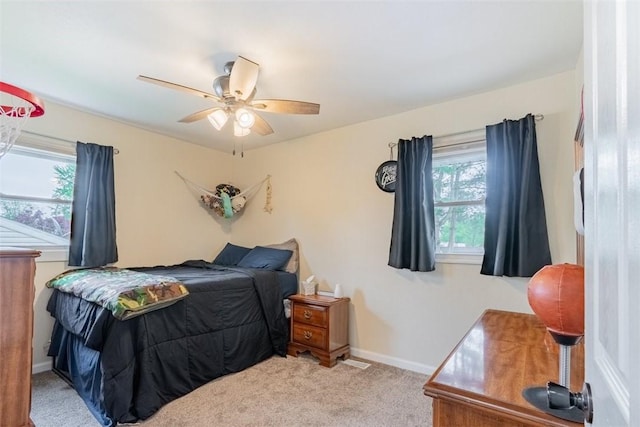 3531 Fontenac Dr, Decatur, IL 62521 - bedroom with a ceiling fan, baseboards, and carpet