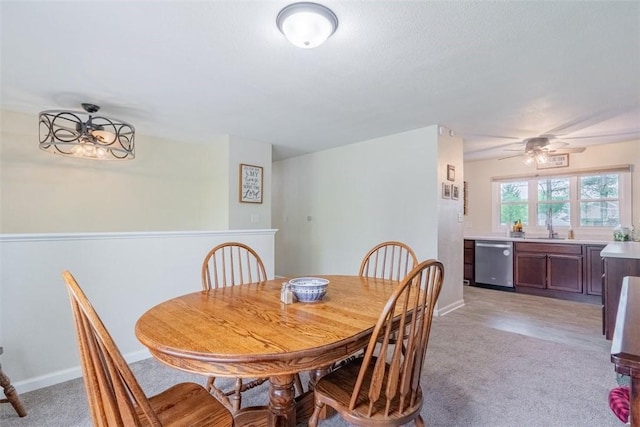 3531 Fontenac Dr, Decatur, IL 62521 - dining area featuring baseboards, ceiling fan, and light carpet