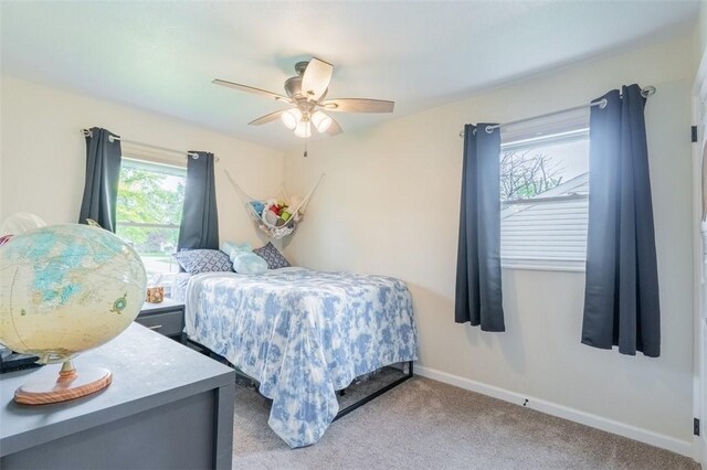 3531 Fontenac Dr, Decatur, IL 62521 - bedroom with baseboards, carpet, and a ceiling fan