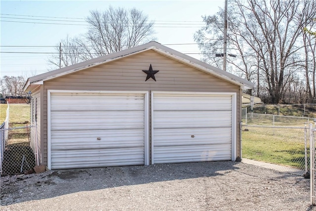 detached garage with fence