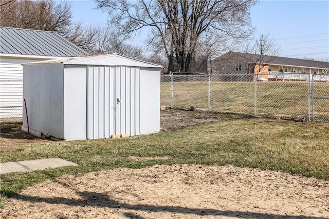 view of shed with fence