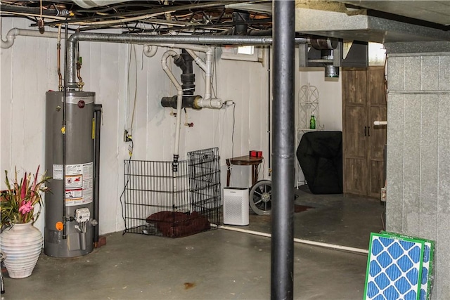 unfinished basement with gas water heater