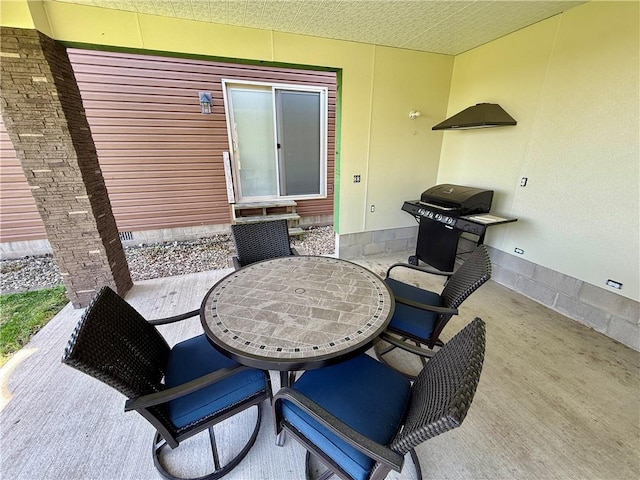 view of patio / terrace featuring grilling area and outdoor dining space