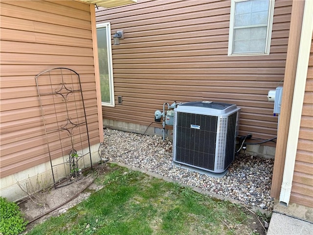 details with central air condition unit and electric meter