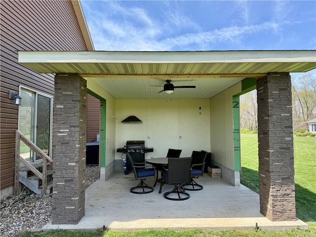 view of patio / terrace with outdoor dining area, a grill, and a ceiling fan