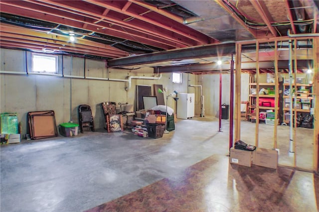 6086 Chicory Knl, Charleston, IL 61920 - below grade area with fridge