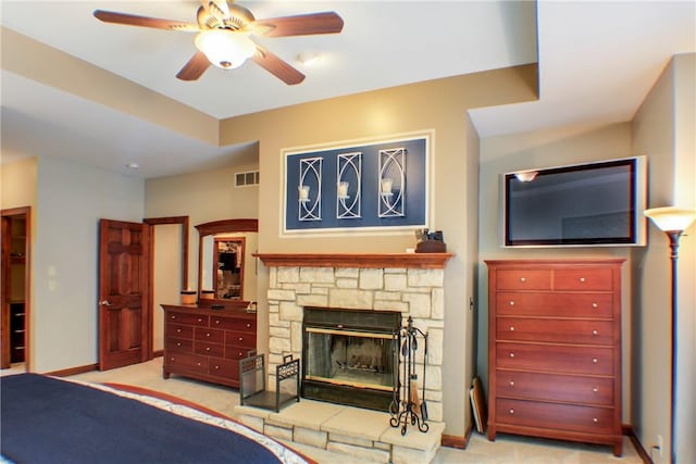 6086 Chicory Knl, Charleston, IL 61920 - bedroom featuring a stone fireplace and baseboards