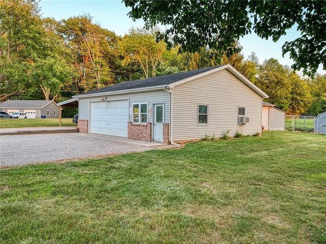 view of property exterior featuring cooling unit, a garage, and a yard