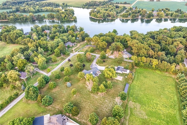 birds eye view of property with a rural view and a water view