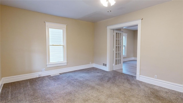 empty room with carpet floors