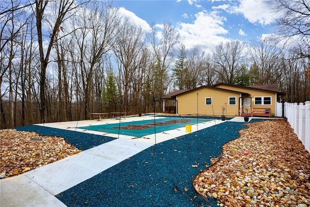 view of swimming pool with a patio