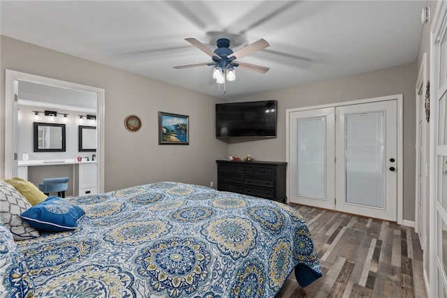 bedroom featuring hardwood / wood-style flooring, ceiling fan, and ensuite bathroom