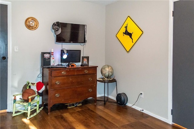 317 Hickory Ln, Mattoon, IL 61938 - bedroom featuring dark wood-style floors and baseboards