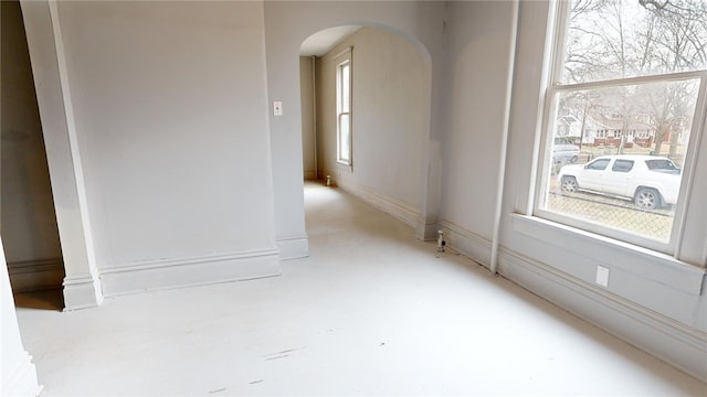 unfurnished room with plenty of natural light