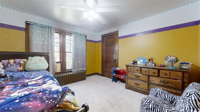 402 Gray St, Sidell, IL 61876 - bedroom featuring radiator heating unit, carpet flooring, and a ceiling fan