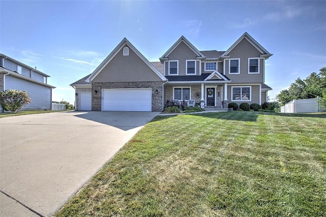1008 Schroll Dr, Forsyth, IL 62535 - view of front of house with a garage, driveway, a porch, and brick siding