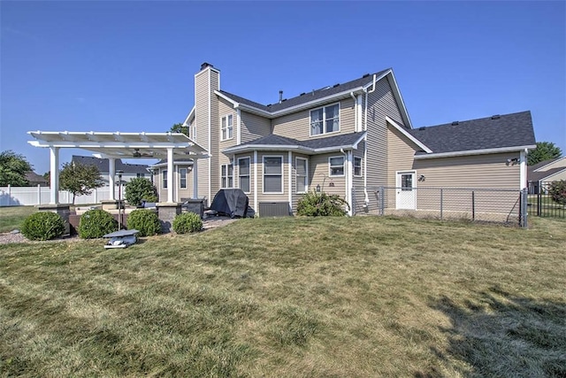 1008 Schroll Dr, Forsyth, IL 62535 - back of property with a pergola, a chimney, a patio, and a fenced backyard