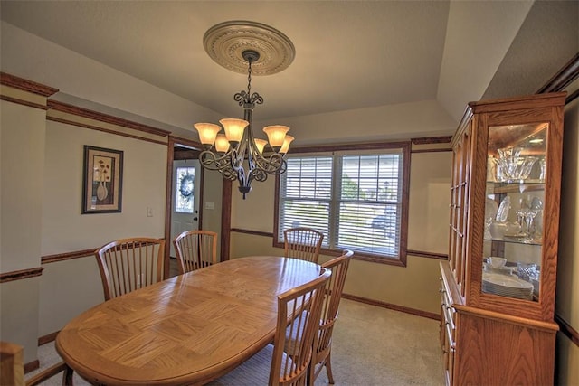 1008 Schroll Dr, Forsyth, IL 62535 - dining area with light colored carpet and a chandelier