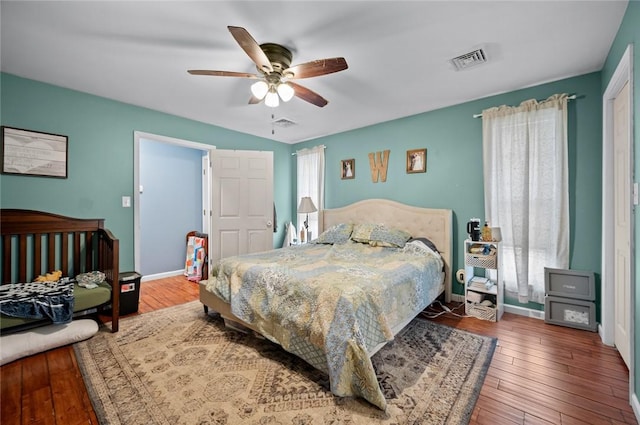 22417 N 1320th St, Marshall, IL 62441 - bedroom with hardwood / wood-style flooring, ceiling fan, and baseboards
