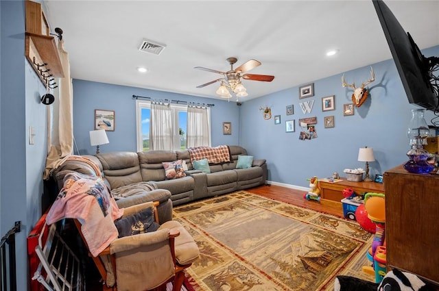 22417 N 1320th St, Marshall, IL 62441 - living area with a ceiling fan, recessed lighting, wood finished floors, and baseboards