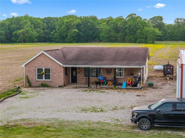 22417 N 1320th St, Marshall, IL 62441 - ranch-style home featuring brick siding and a porch